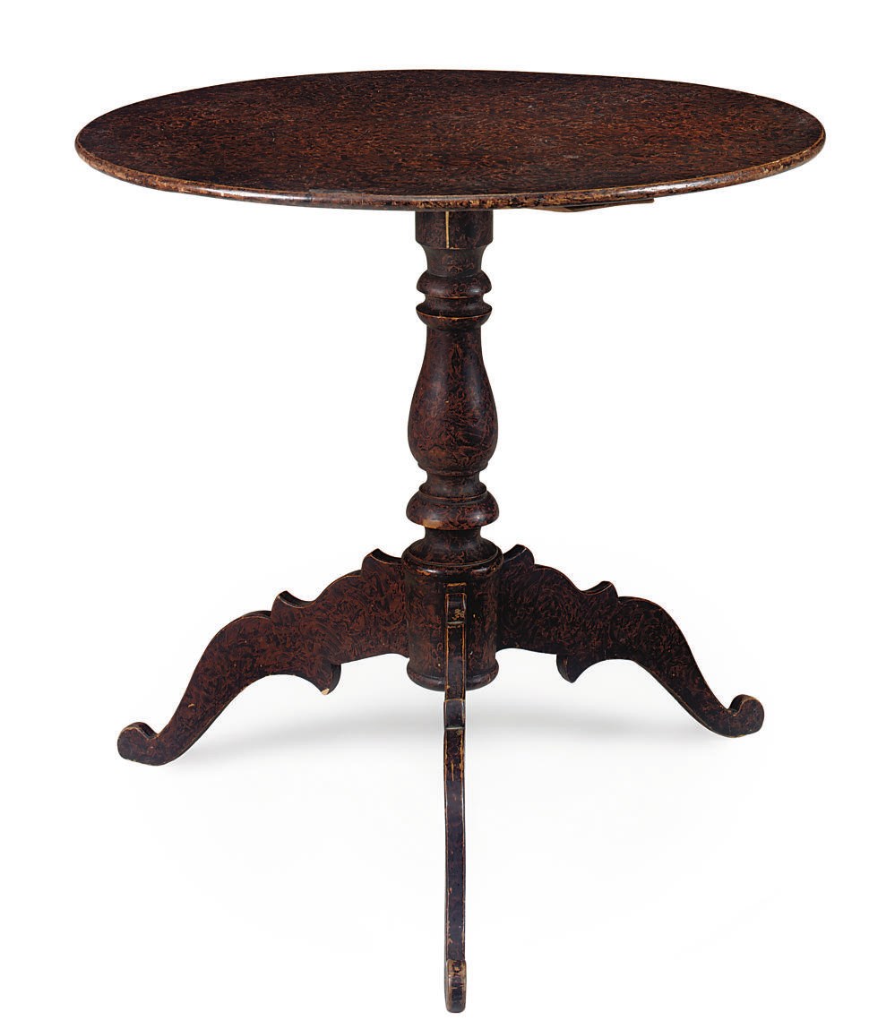 A SWEDISH GRAINED BIRCH TRIPOD TABLE