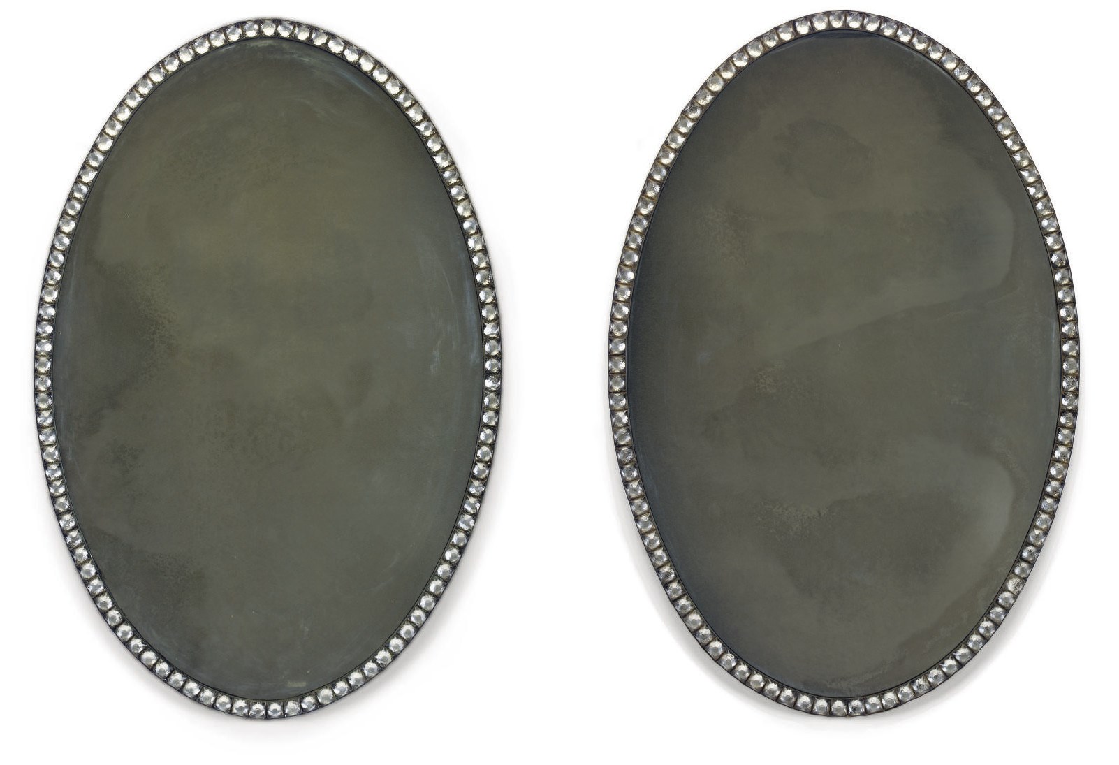 A PAIR OF IRISH CUT-GLASS OVAL MIRRORS