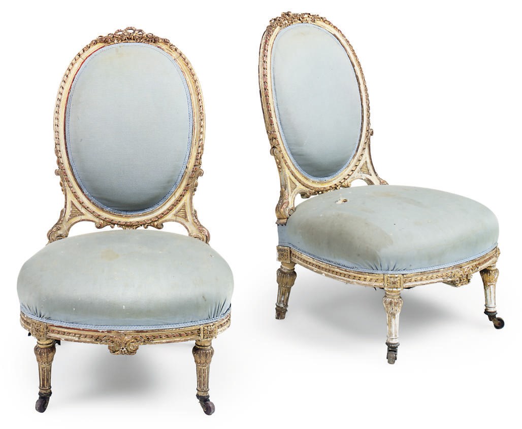 A PAIR OF NAPOLEON III GILTWOOD AND CREAM PAINTED SALON CHAIRS