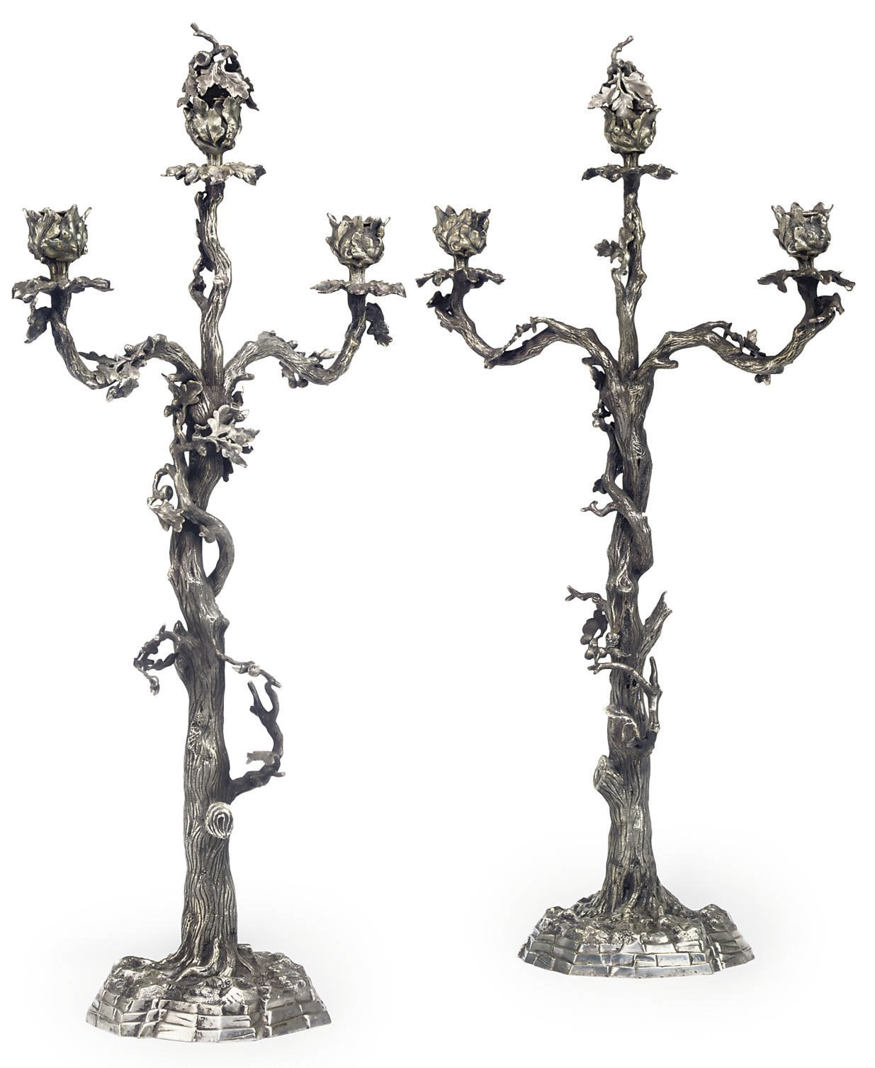 A PAIR OF VICTORIAN SILVER-PLATED THREE-LIGHT CANDELABRA