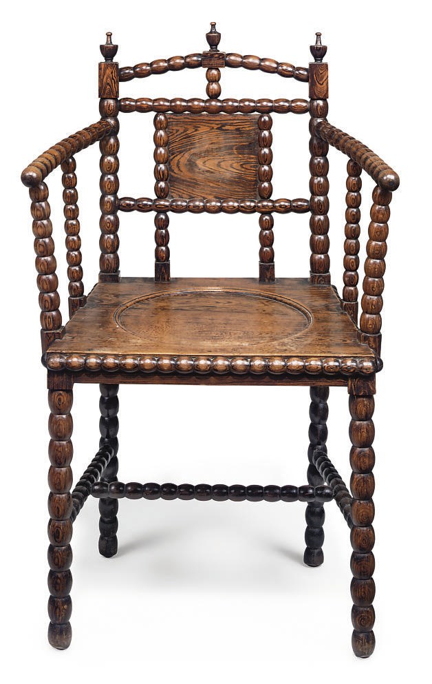 A FRENCH GRAINED ROSEWOOD BOBBIN-TURNED ARMCHAIR
