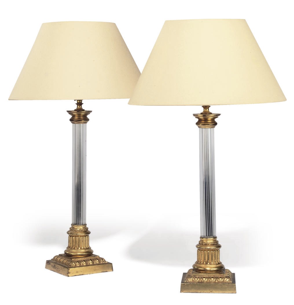 A PAIR OF GILT-BRONZE AND GLASS COLUMN TABLE LAMPS