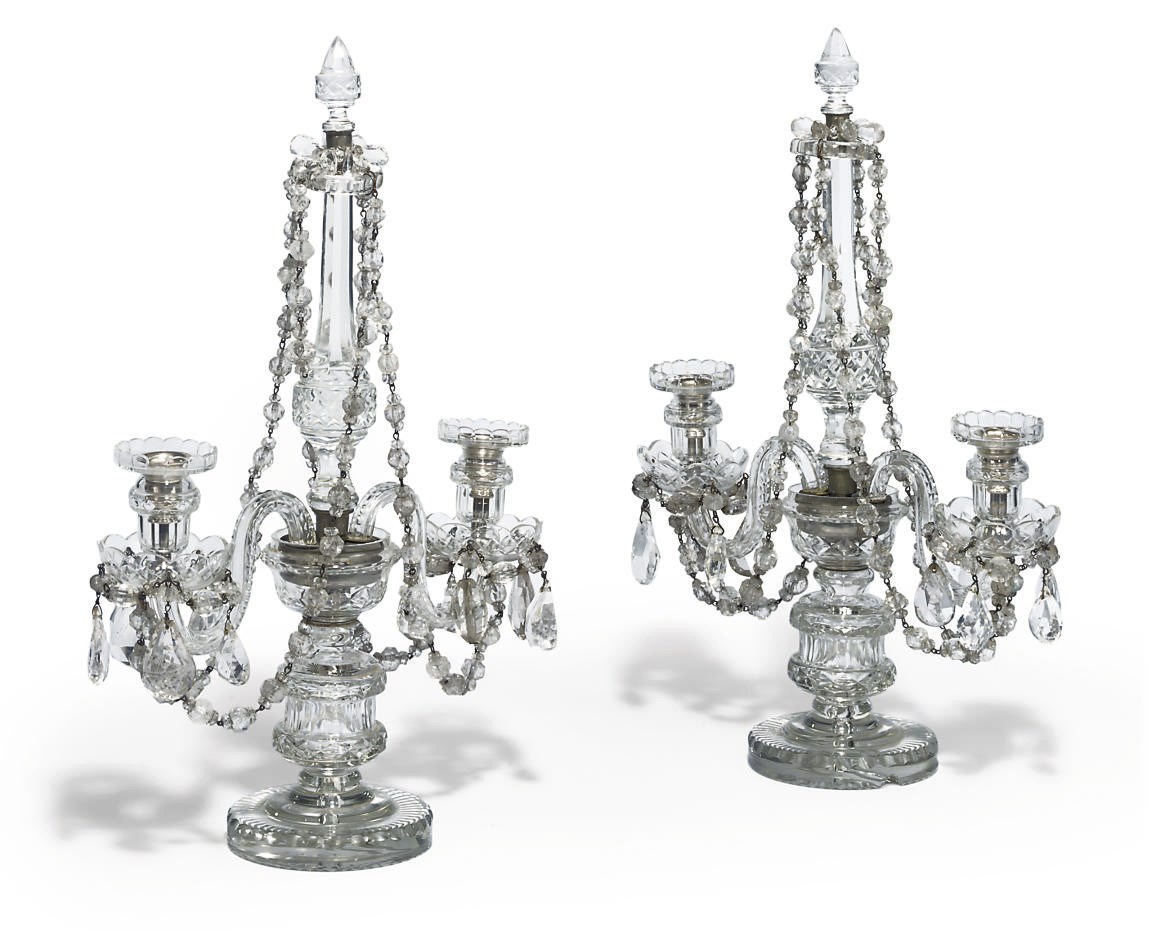 A PAIR OF EAST EUROPEAN CUT AND MOULDED GLASS TWIN-LIGHT CANDELABRA