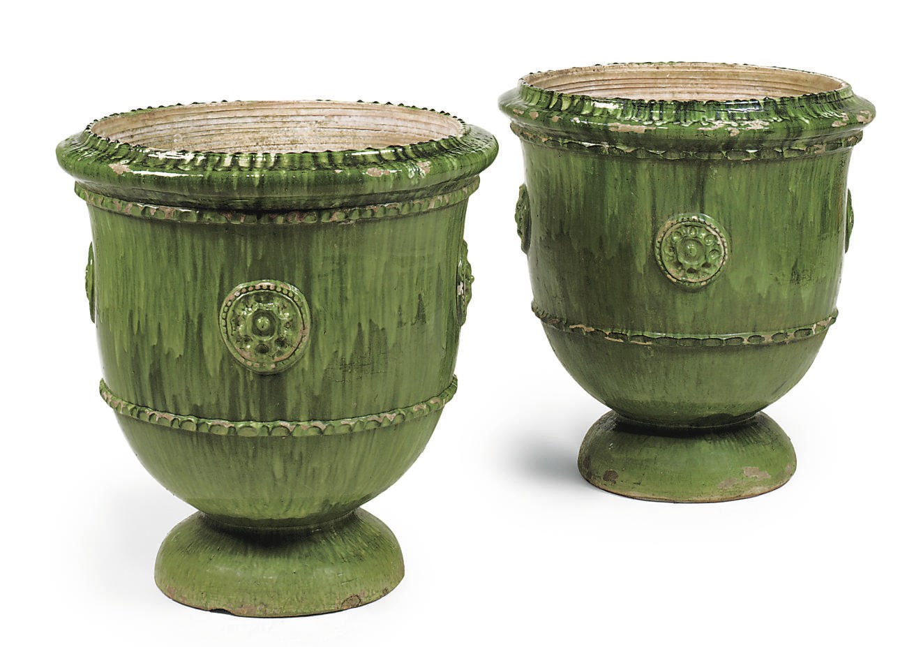A PAIR OF LARGE FRENCH GREEN-GLAZED TERRACOTTA JARDINIÉRES