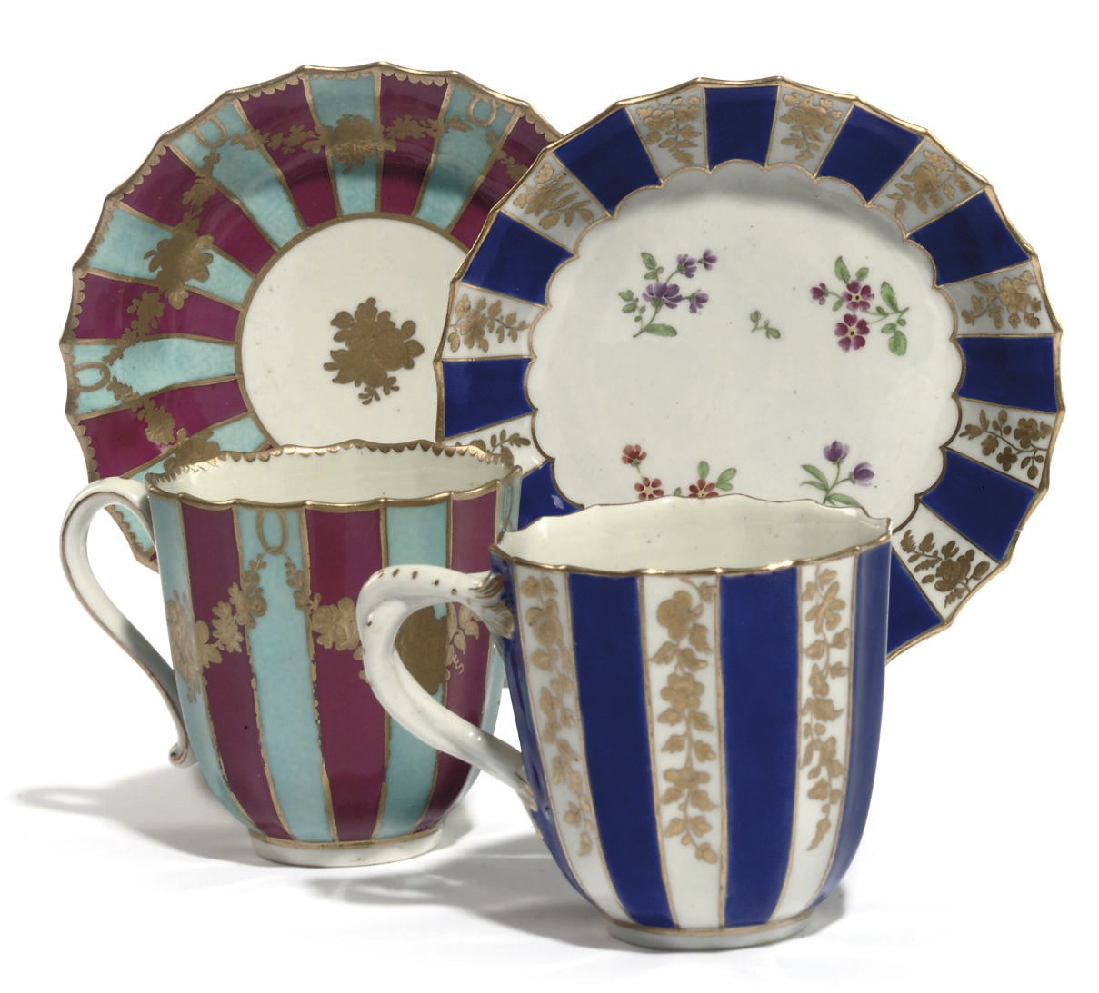 TWO WORCESTER LATER-DECORATED FACETED COFFEE-CUPS AND SAUCERS