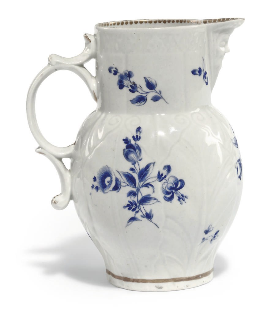 A WORCESTER LEAF-MOULDED MASK-JUG
