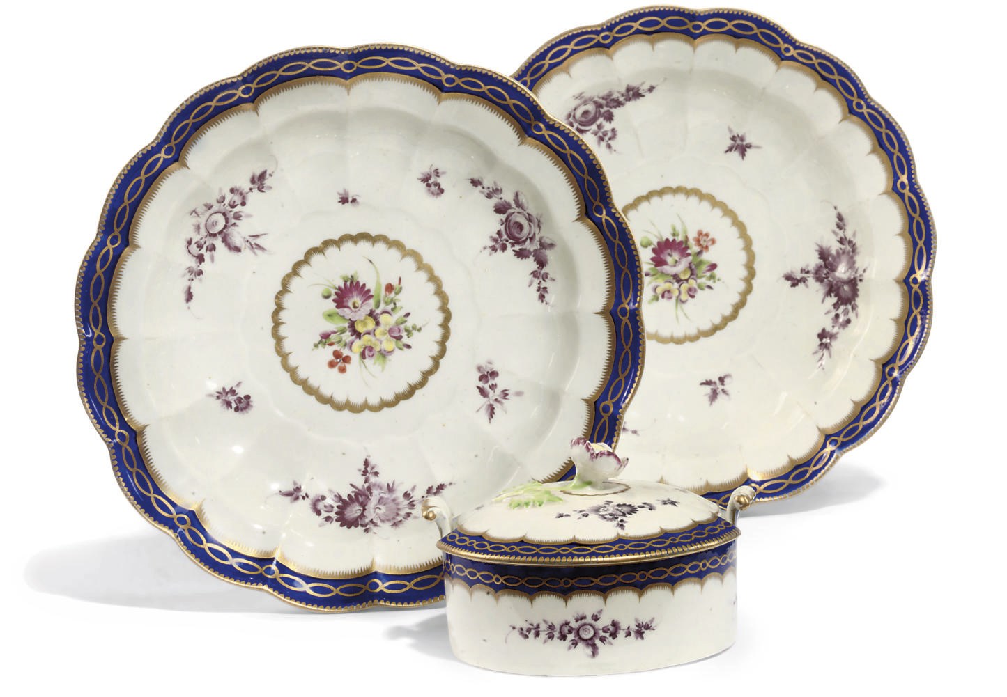 A WORCESTER TWO-HANDLED CYLINDRICAL BUTTER-TUB AND COVER AND TWO FLUTED DISHES