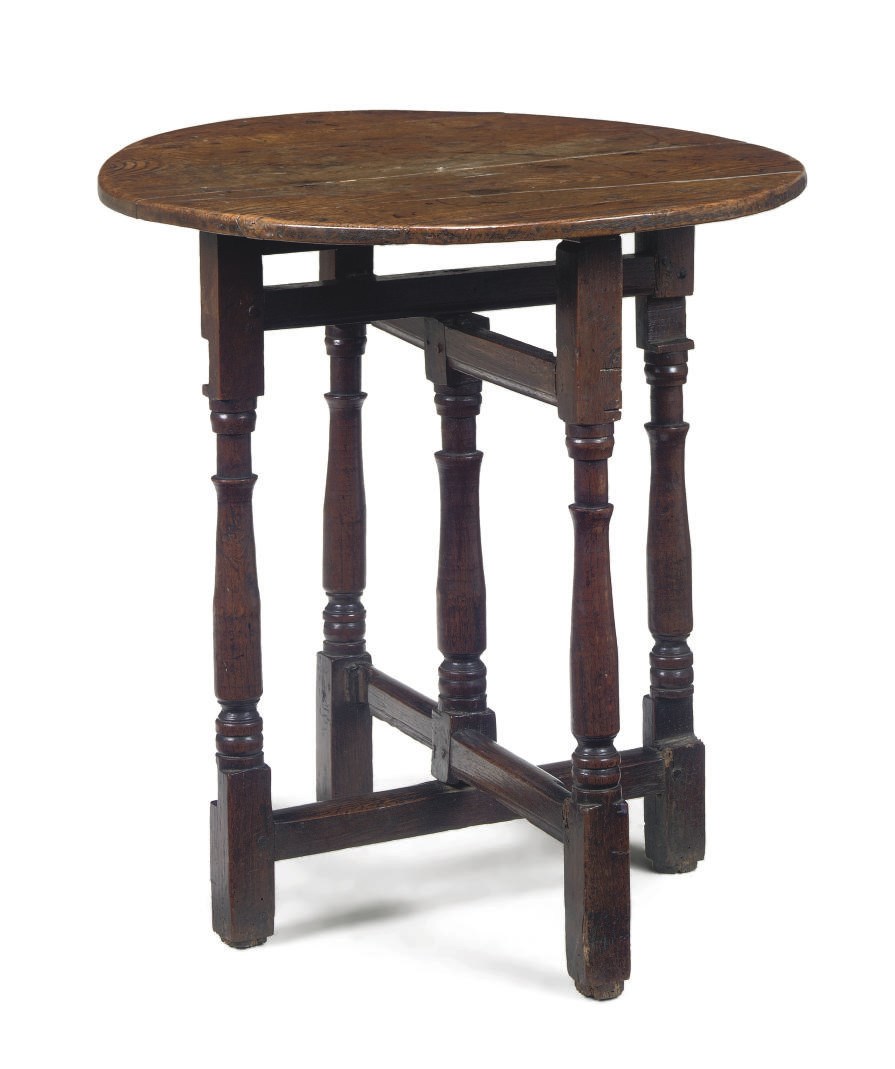 AN ENGLISH OAK FOLDING GATELEG TABLE