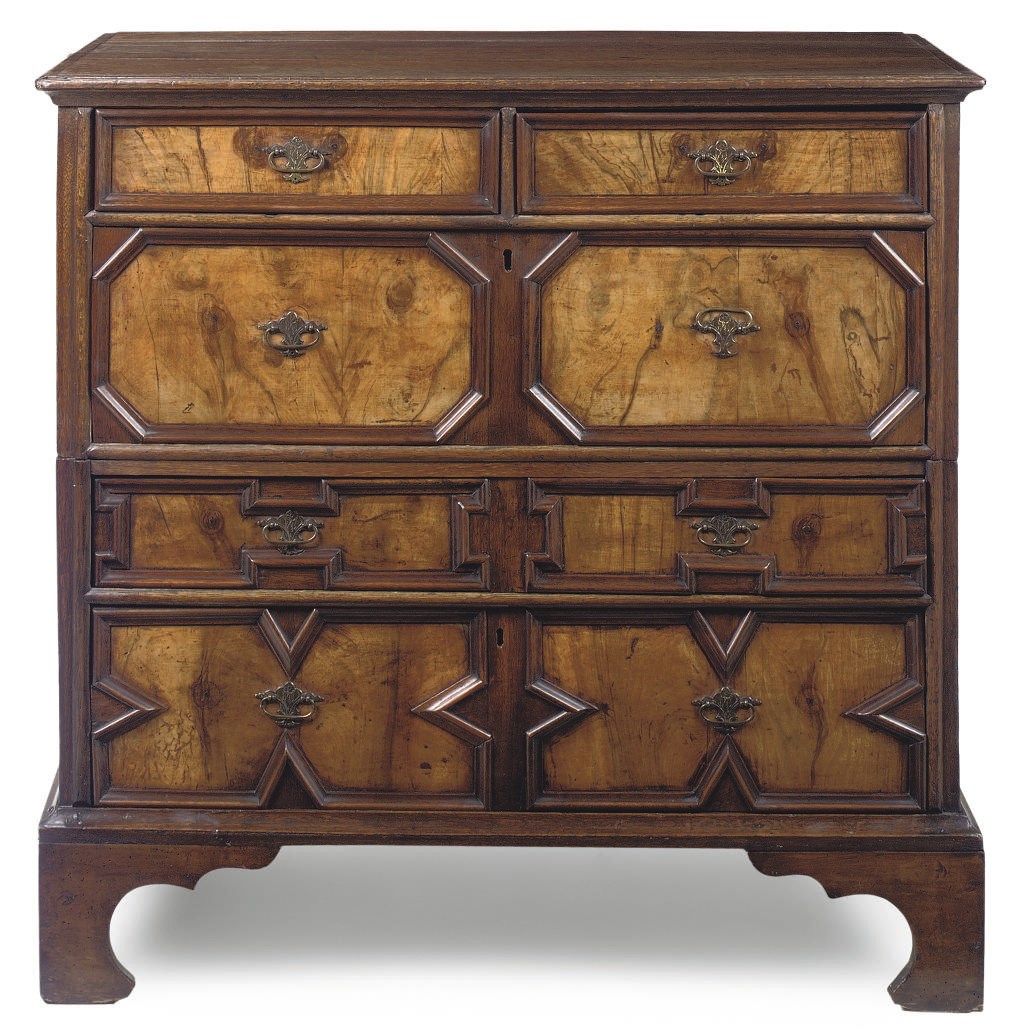 AN ENGLISH OAK AND WALNUT CHEST