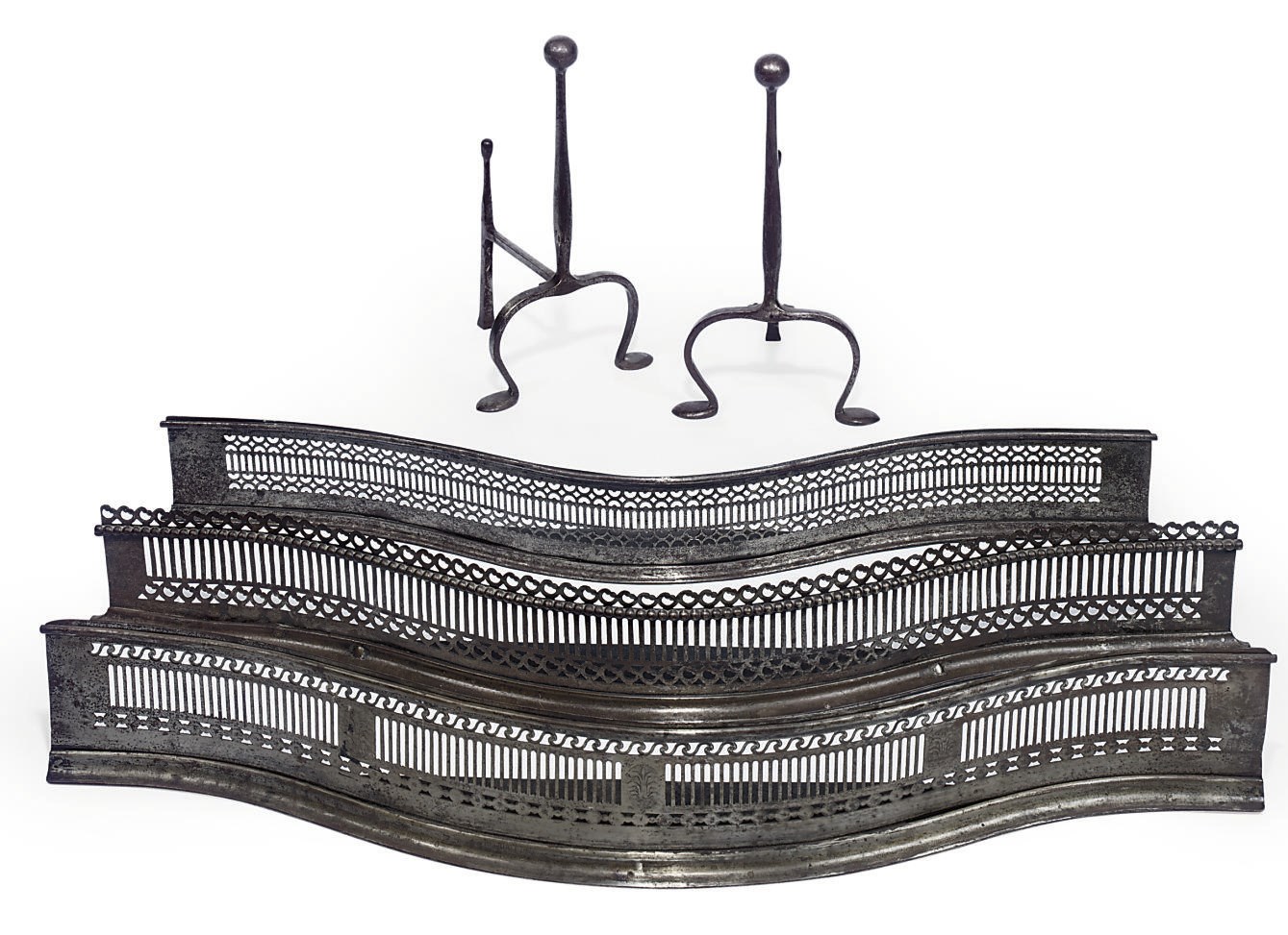 THREE GEORGE III PIERCED STEEL FENDERS
