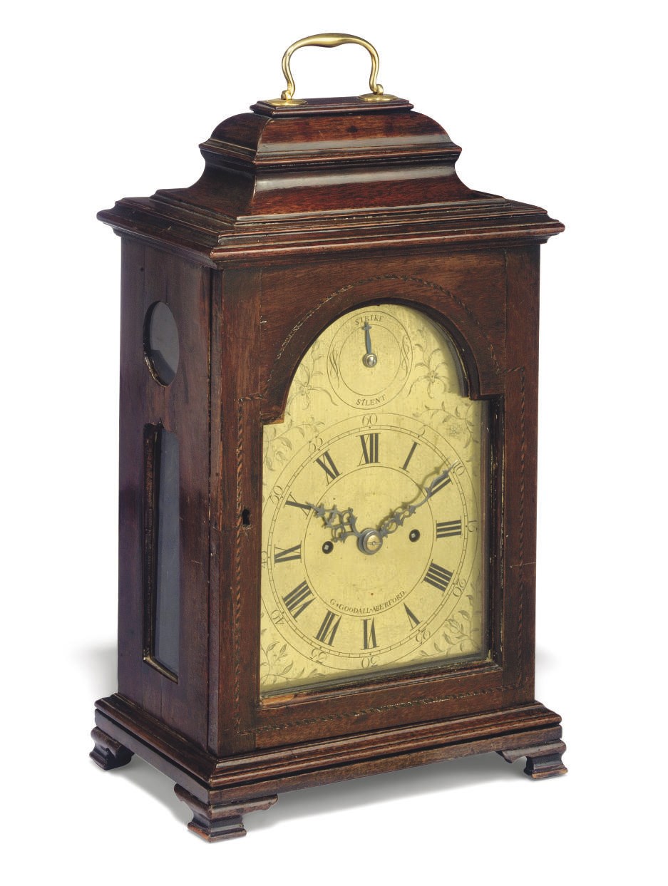 A GEORGE III MAHOGANY QUARTER STRIKING EIGHT DAY TABLE CLOCK
