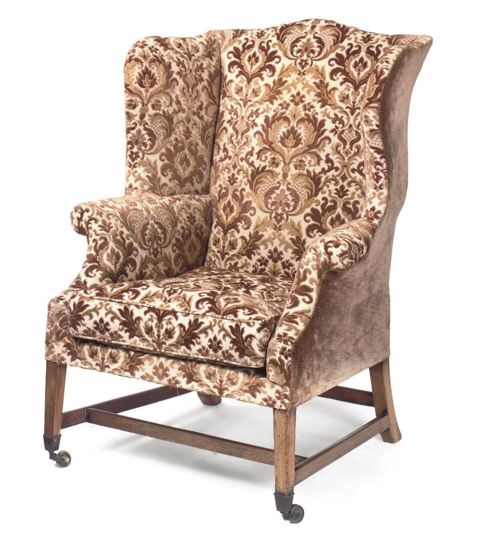 A GEORGE III MAHOGANY WING ARMCHAIR