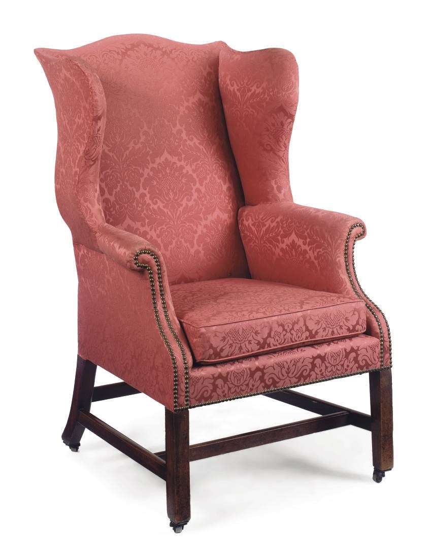 A GEORGE III MAHOGANY WING ARMCHAIR