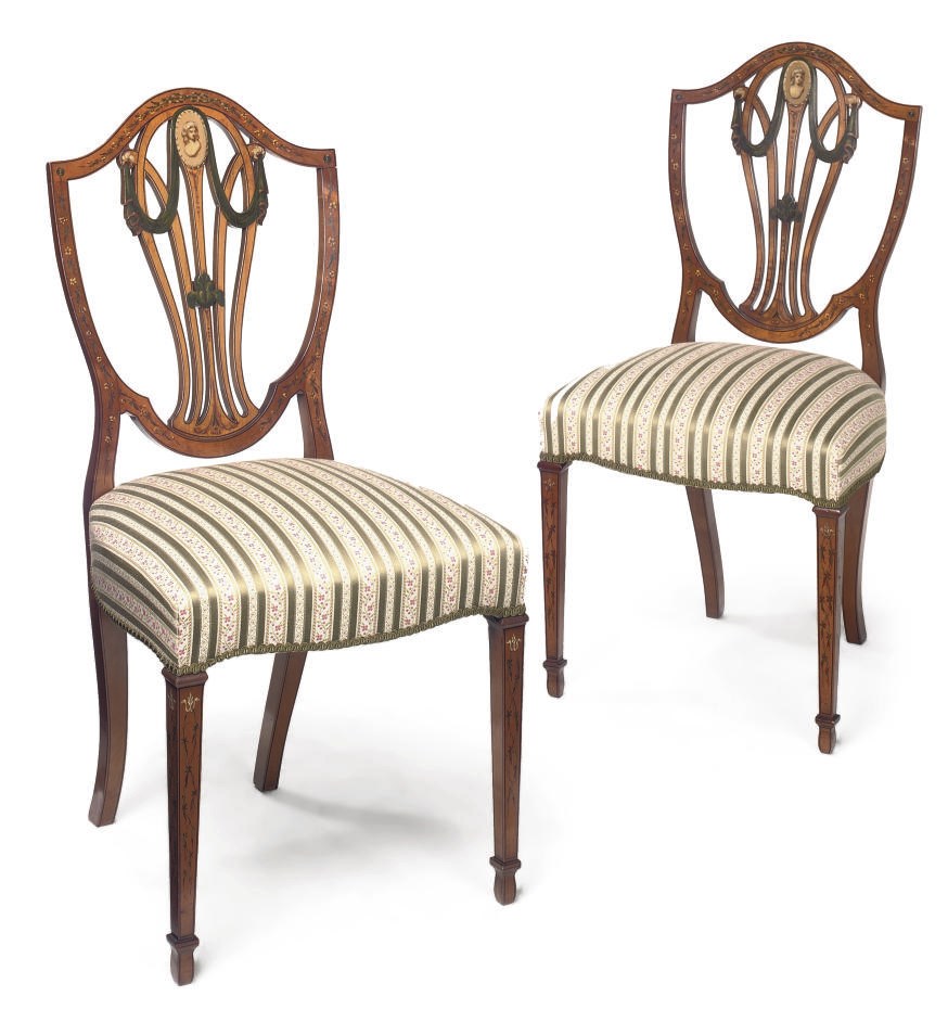 A PAIR OF EDWARDIAN SATINWOOD AND POLYCHROME DECORATED CHAIRS