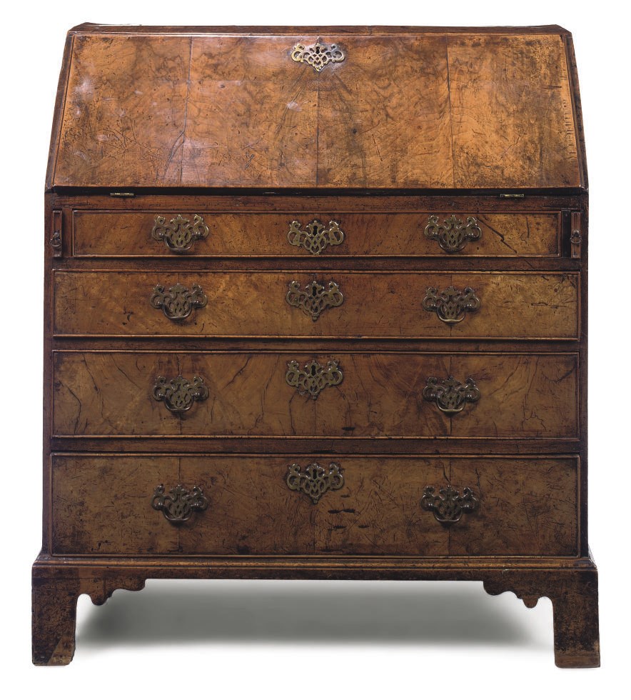 A GEORGE II WALNUT AND OAK BUREAU