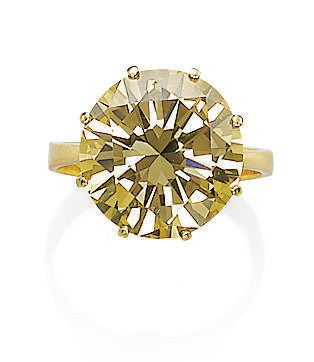 A COLOURED DIAMOND RING