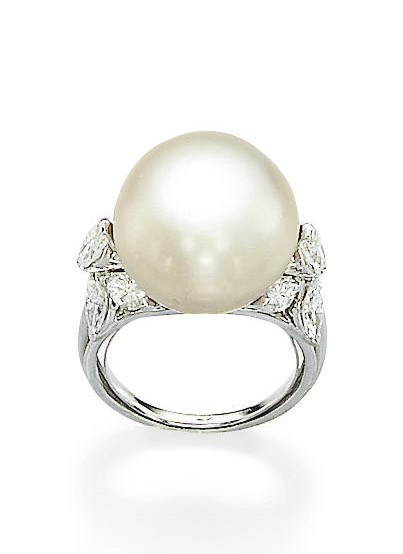 A NATURAL PEARL AND DIAMOND RING