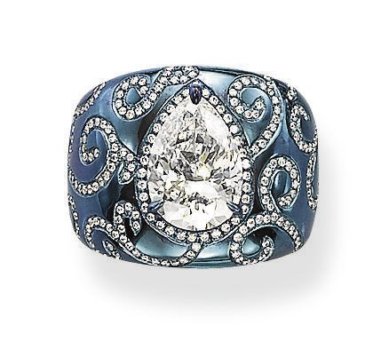 A STYLISH TITANIUM AND DIAMOND RING, BY J. KOO