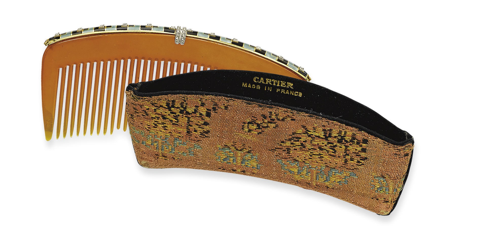 **AN ELEGANT ART DECO TORTOISESHELL, ENAMEL AND DIAMOND HAIR COMB, BY CARTIER