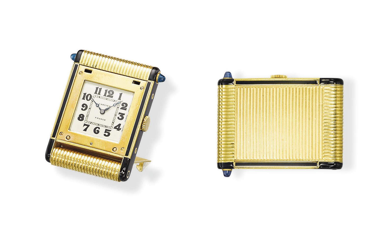 AN ART DECO GOLD, ENAMEL AND SAPPHIRE 'KODAK' TABLE CLOCK, BY CARTIER