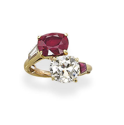 A RUBY AND DIAMOND "TOI & MOI" RING, MOUNTED BY CARTIER