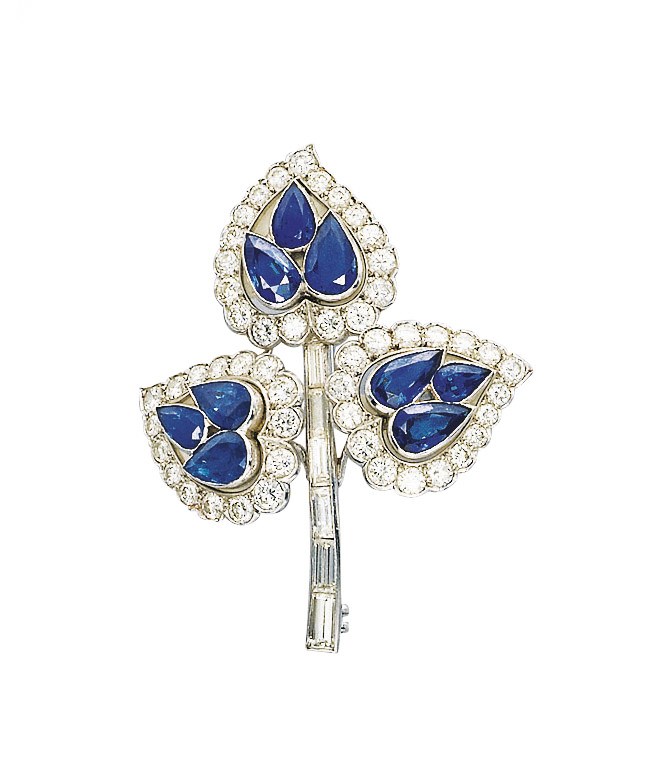 A SAPPHIRE AND DIAMOND BROOCH BY CARTIER
