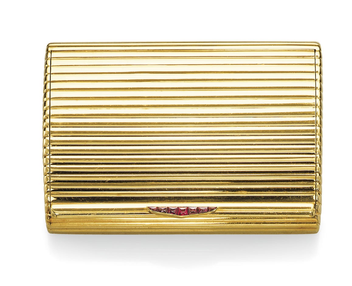A GOLD AND RUBY CIGARETTE CASE, BY CARTIER