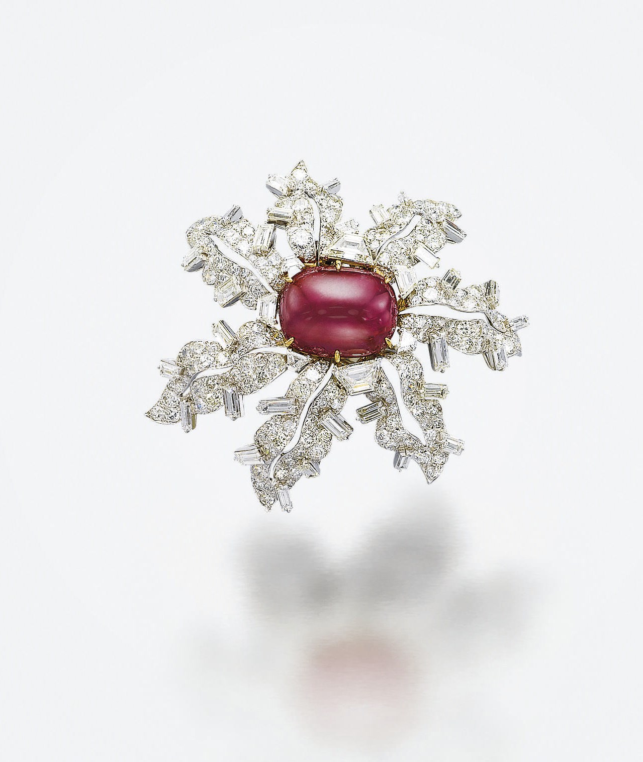A RUBY AND DIAMOND BROOCH, MOUNTED BY CARTIER