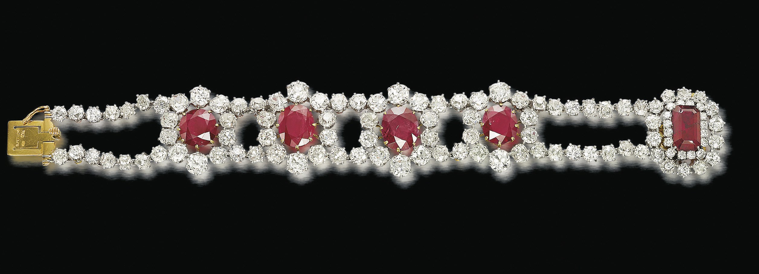 A RUBY AND DIAMOND BRACELET, BY PETOCHI