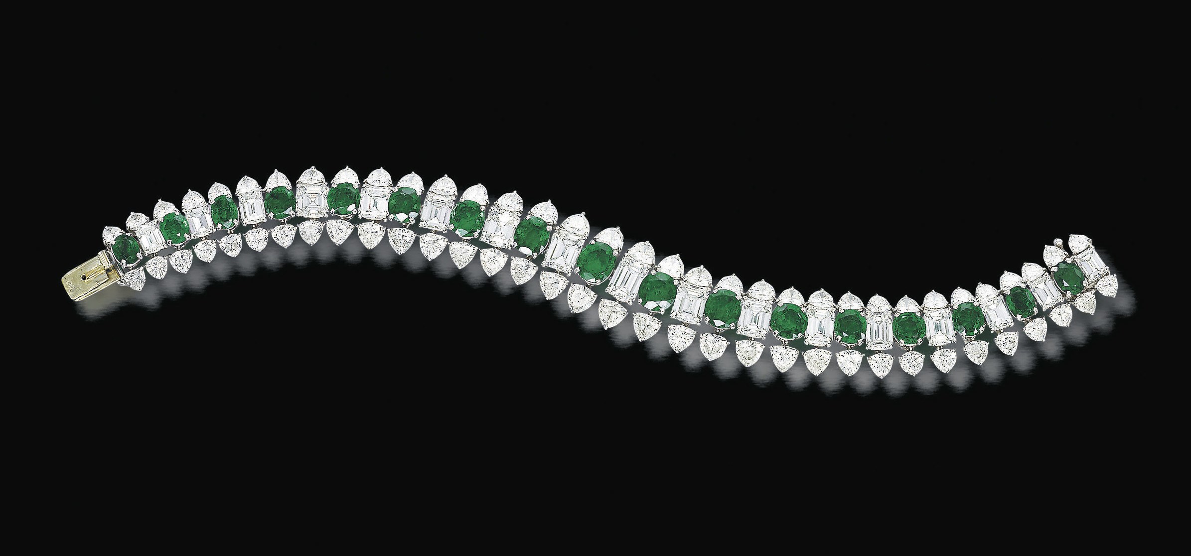 AN EMERALD AND DIAMOND BRACELET, BY HARRY WINSTON