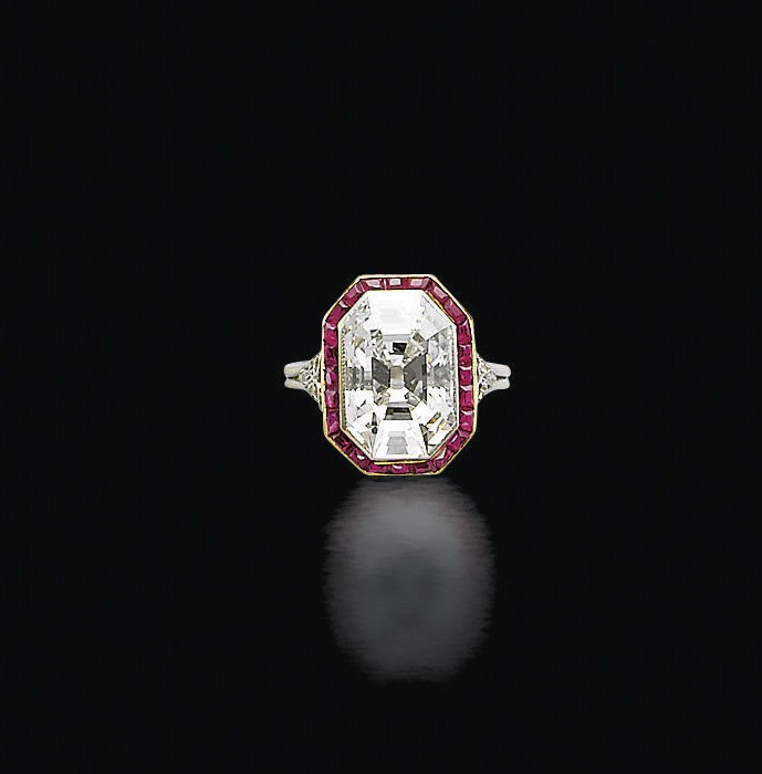 AN ART DECO DIAMOND AND RUBY RING