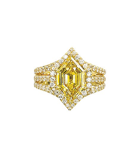 A COLOURED DIAMOND AND DIAMOND RING