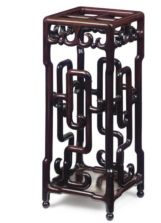 A CHINESE ROSEWOOD STICK STAND