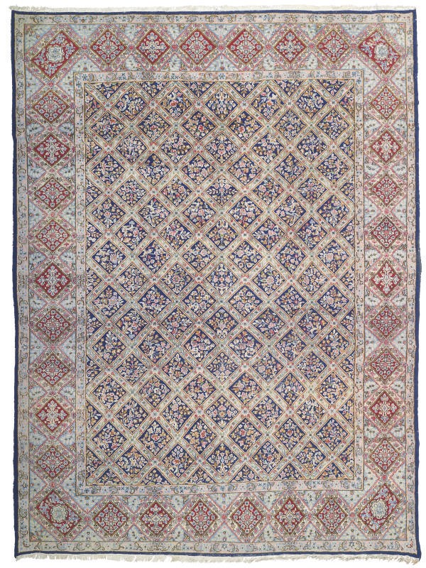 A fine Kirman carpet