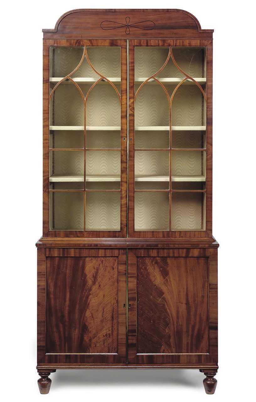 A REGENCY MAHOGANY LINE INLAID BOOKCASE CABINET