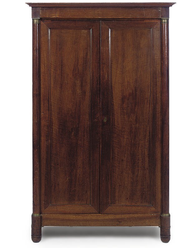 AN EMPIRE MAHOGANY AND BRASS MOUNTED ARMOIRE