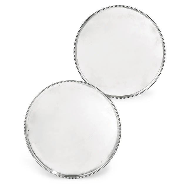 A PAIR OF DUTCH SILVER SALVERS IN THE LATE 18TH CENTURY STYLE