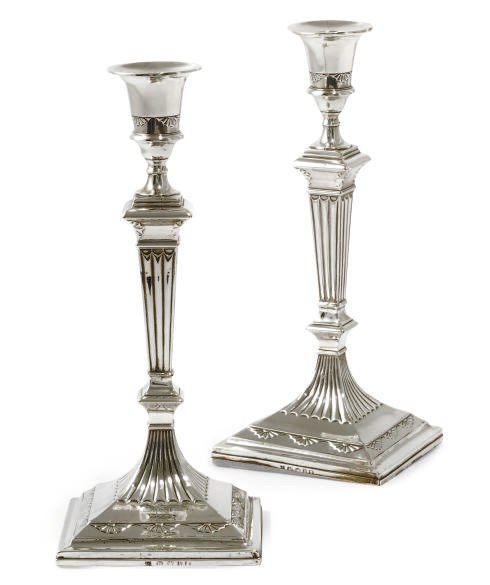 A PAIR OF GEORGE III SILVER CANDLESTICKS