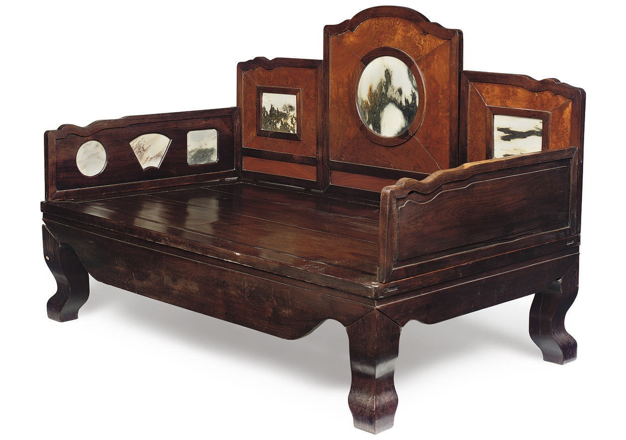 A CHINESE ROSEWOOD AND DREAMSTONE MOUNTED BED