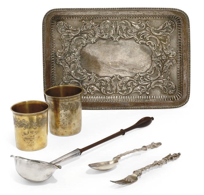 A GEORGE II SILVER DOUBLE-LIPPED PUNCH LADLE