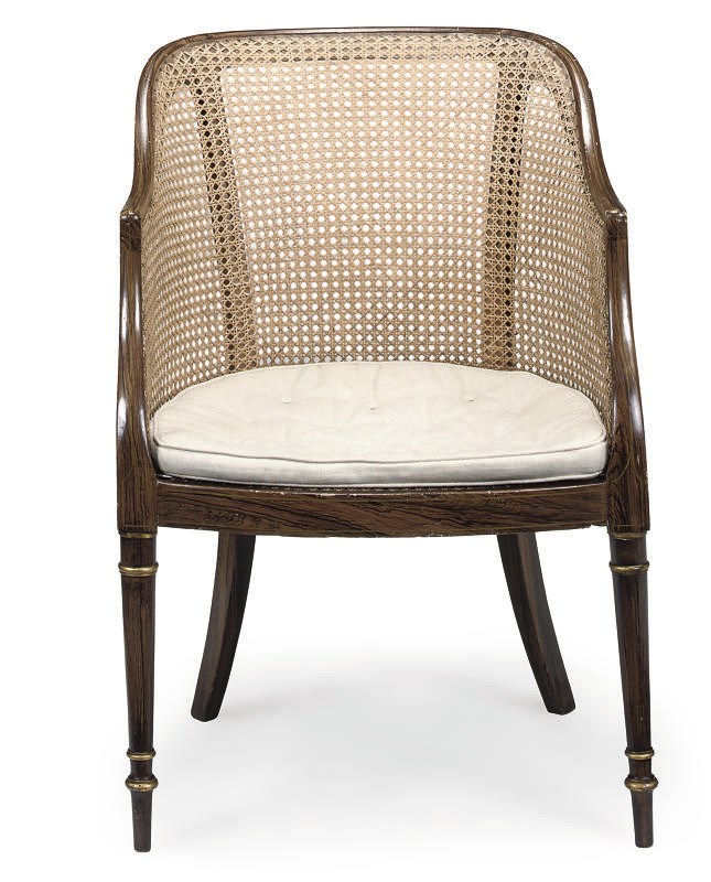 A REGENCY SIMULATED ROSEWOOD CANED LIBRARY BERGERE