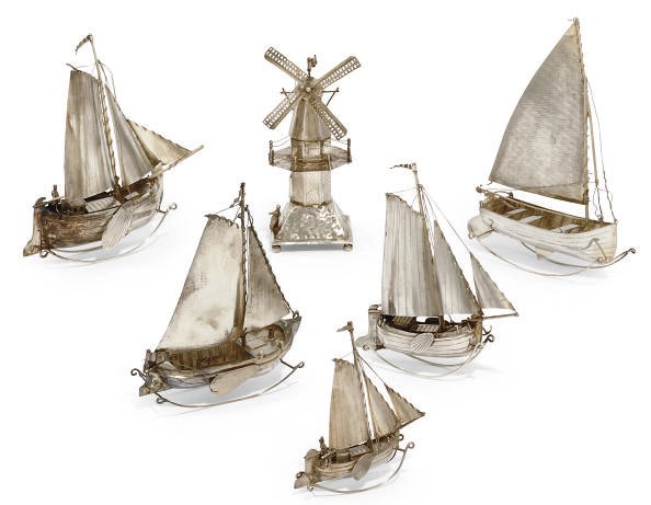 A GROUP OF DUTCH SILVER TOY SAILING SHIPS