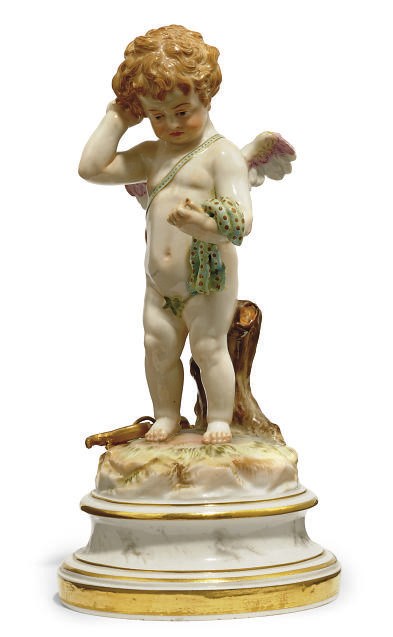 A MEISSEN FIGURE OF CUPID