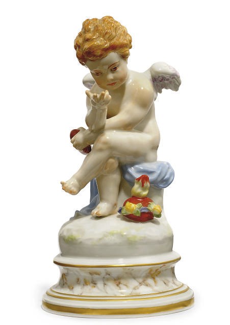 A MEISSEN FIGURE OF CUPID