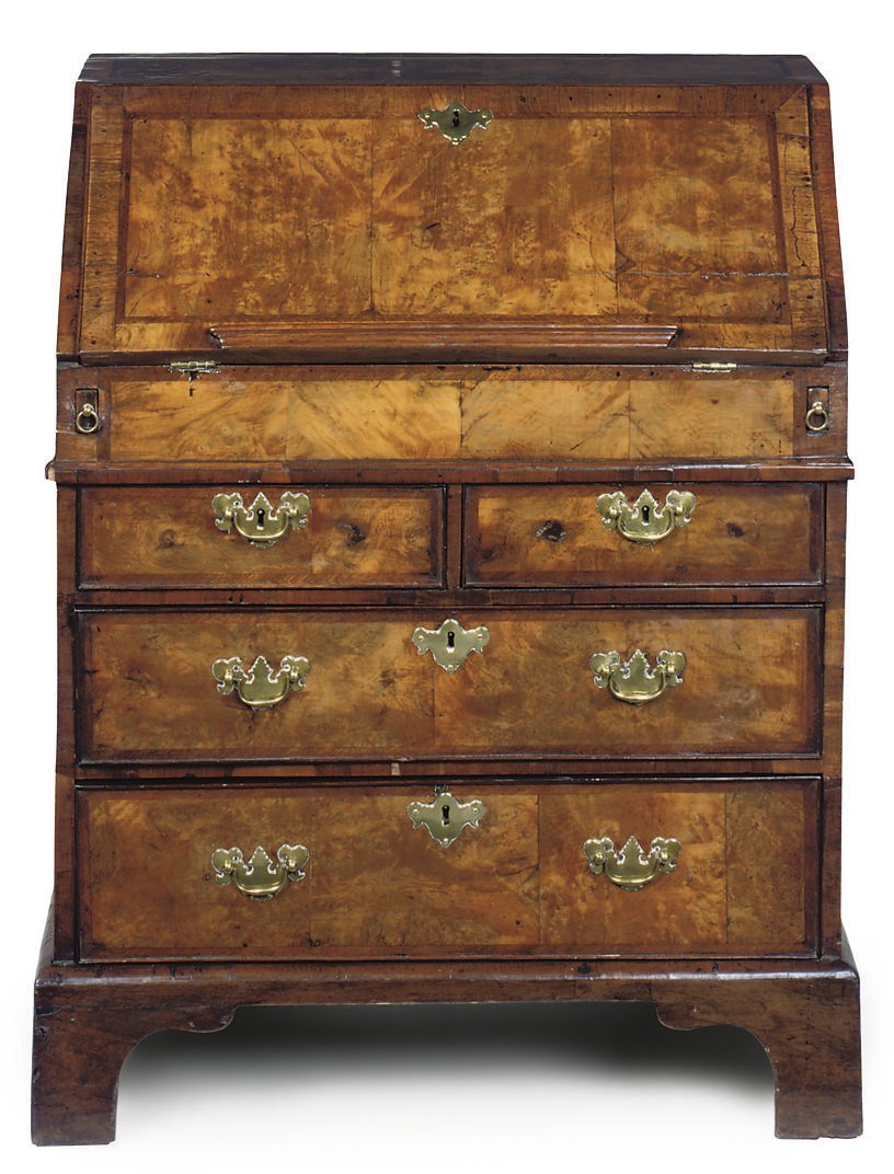 A QUEEN ANNE WALNUT FEATHER BANDED AND CROSSBANDED BUREAU