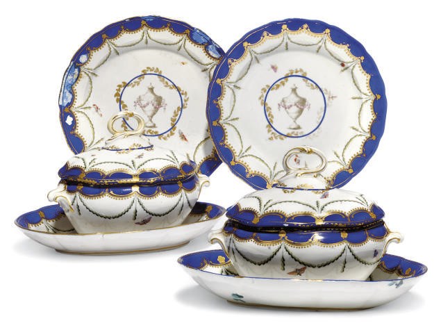 A PAIR OF CHELSEA-DERBY PORCELAIN SAUCE TUREENS, COVERS AND STANDS AND A PAIR OF PLATES EN-SUITE