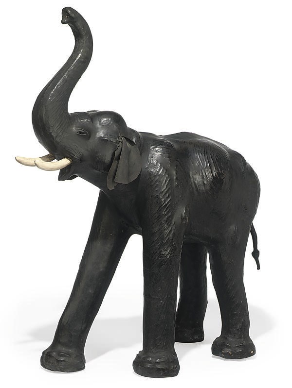A NOVELTY LEATHER MODEL OF AN ELEPHANT