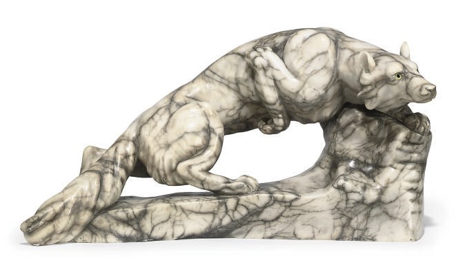 AN ITALIAN ALABASTER MODEL OF A FOX