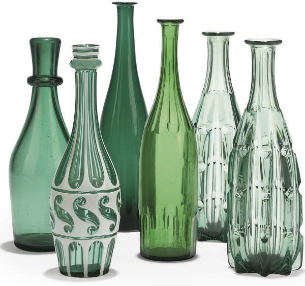 A COLLECTION OF SIX GLASS BOTTLES