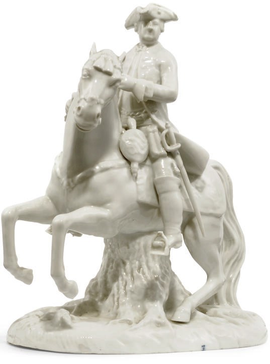A GERMAN WHITE PORCELAIN EQUESTRIAN FIGURE